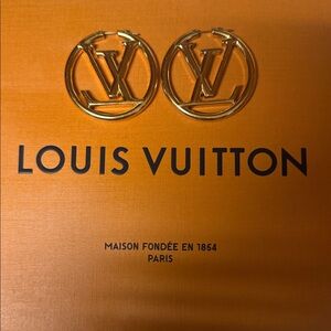 Genuine Louis Vuitton Gold Circle LV Logo Earrings.